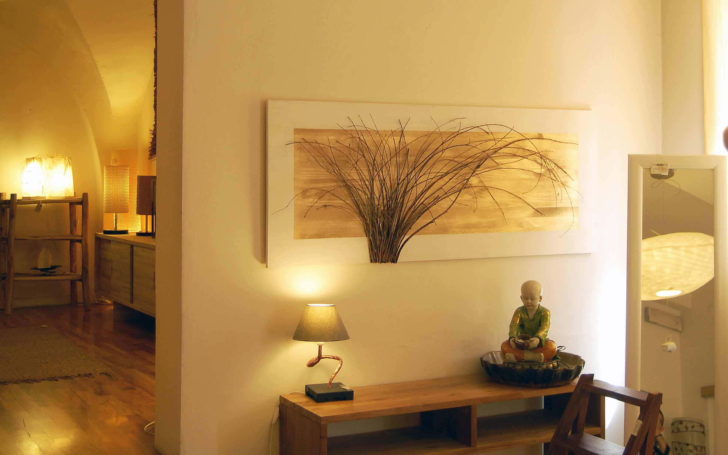 Quadro etnico realizzato con rami di recupero